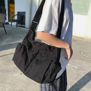 Ensfarvet Messenger taske i kanvas