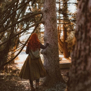 Rygsæk i lærred med bladmønster