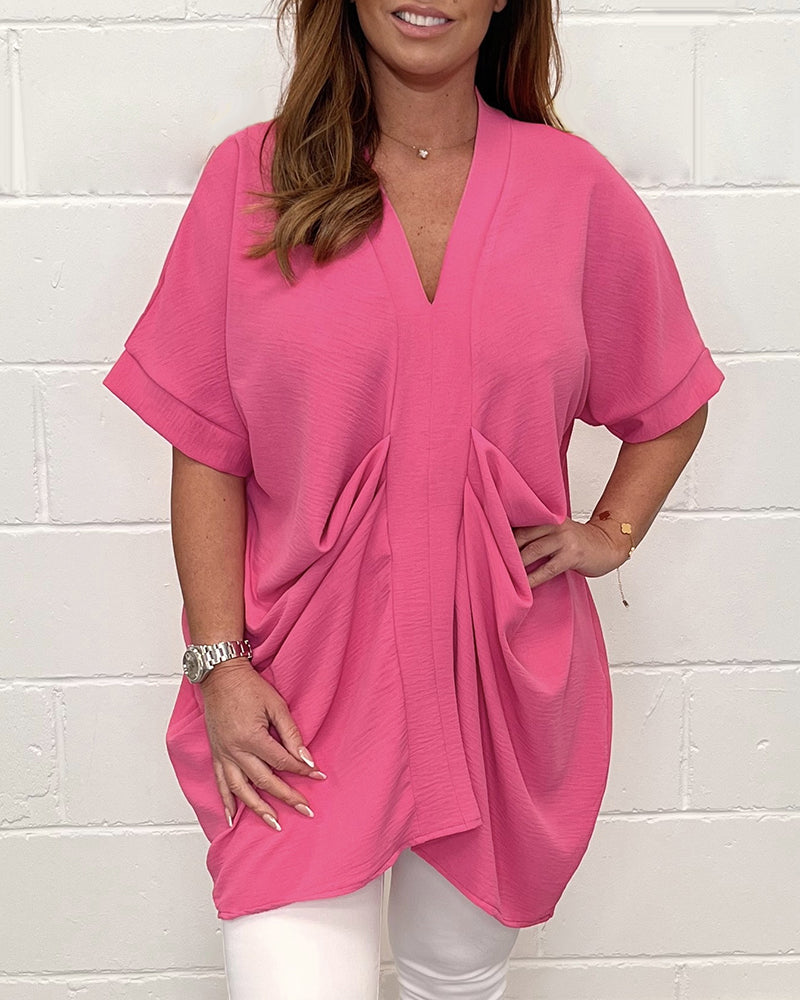 V-ringad topp i enfärgad