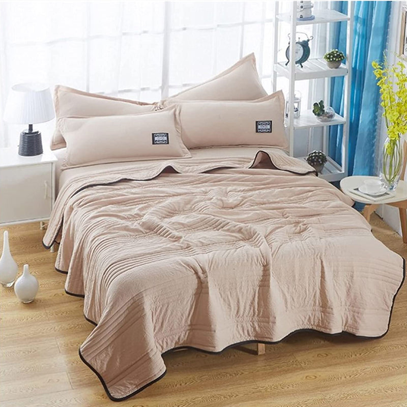 Ensfarvet sommerdyne