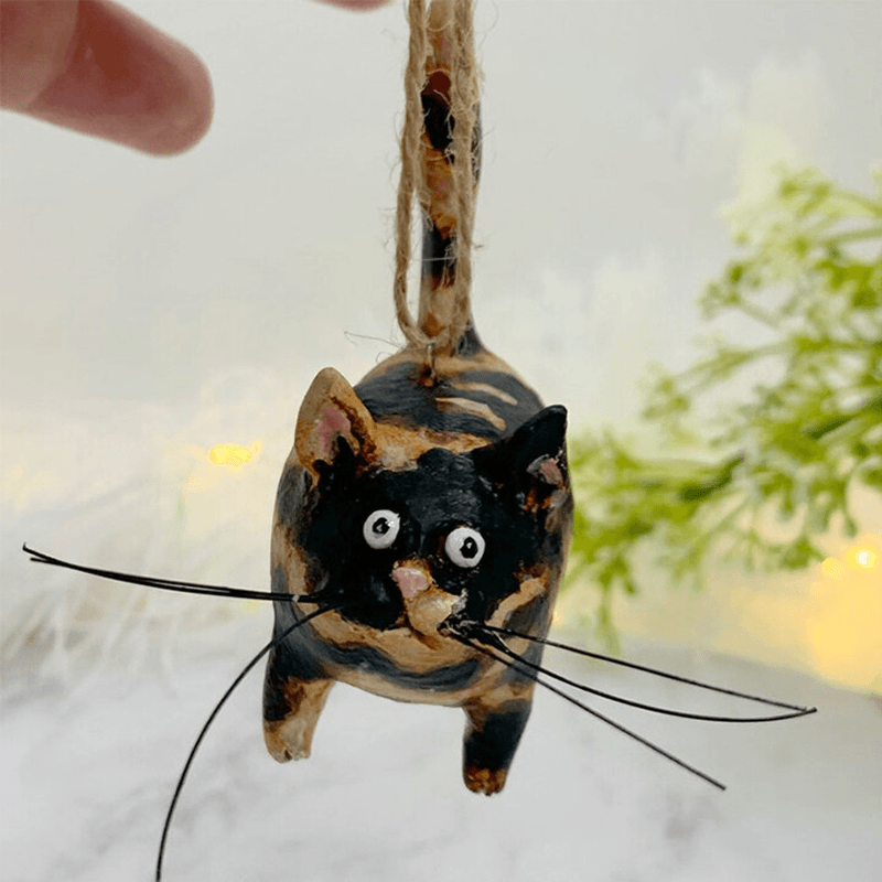 Miniature katteskulptur