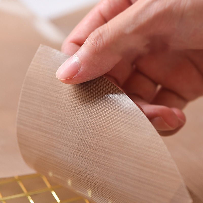 Genanvendeligt og holdbart papirark til frigivelse af kager