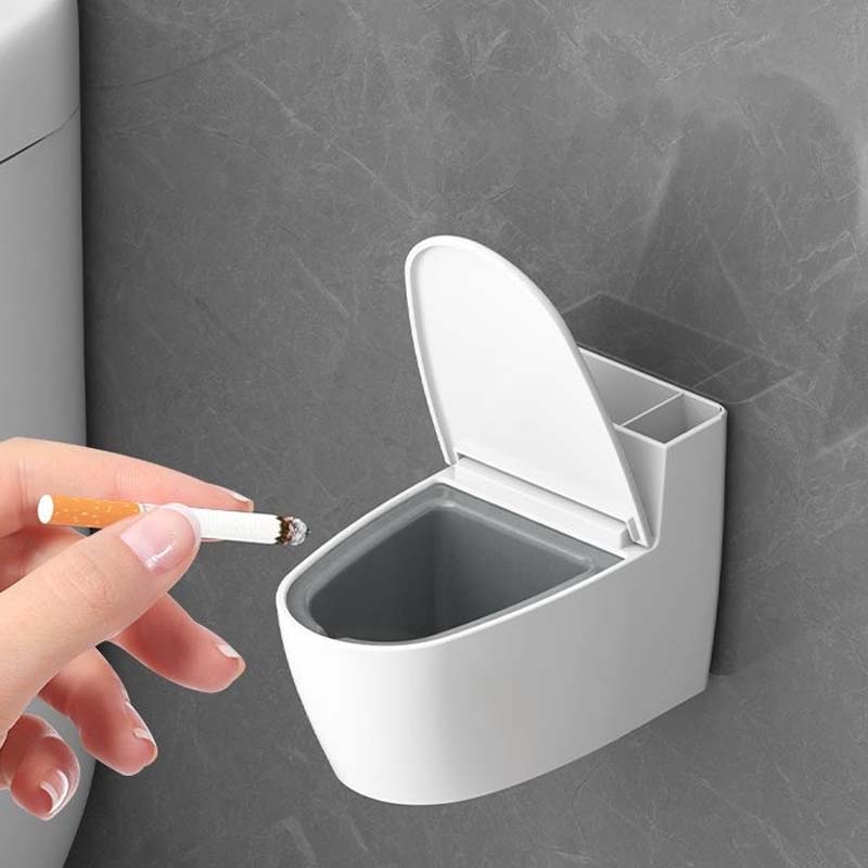 Kreativt toiletformet askebæger