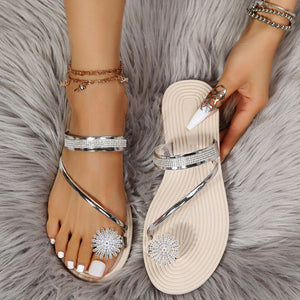 Flade sandaler med skinnende rhinsten