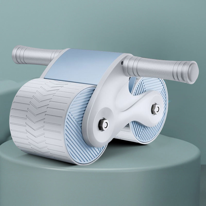 Træningsredskab med automatisk tilbagetrækning