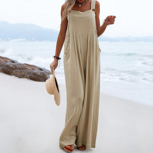 Ensfarvet jumpsuit med brede ben og knapper