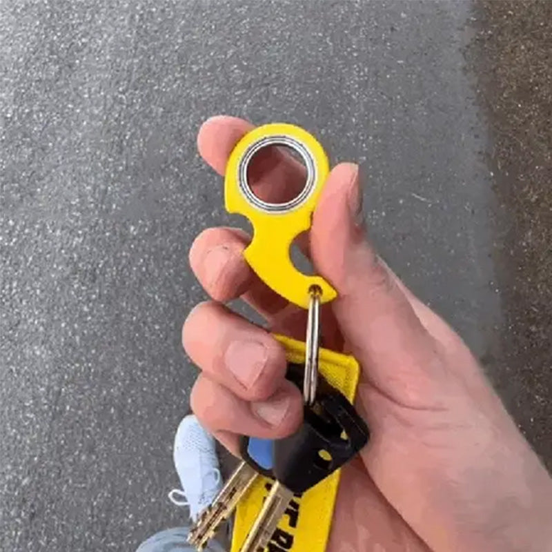 Spinnende nøglering