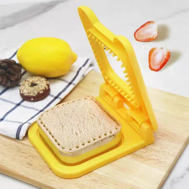Sandwichformsskærer og forsegler