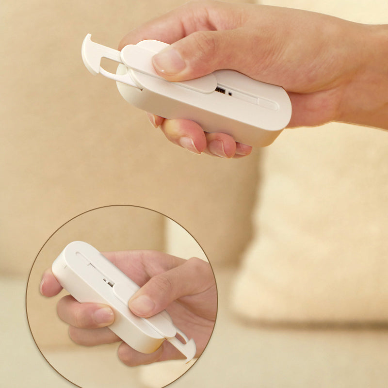 Bærbar to-vejs tandtrådsdispenser