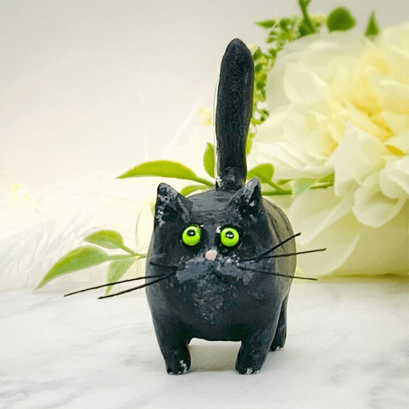 Miniature katteskulptur